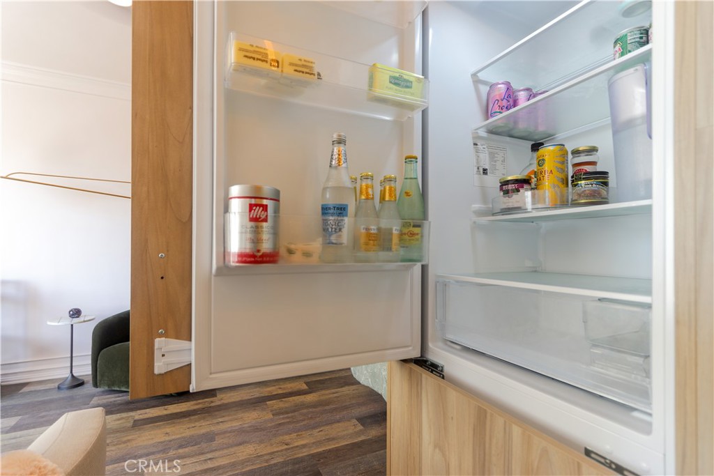 800 East Ocean Boulevard, Unit 1007 Long Beach, CA 90802 - Photo 16 of 43 a view of a hallway with wooden floor and windows