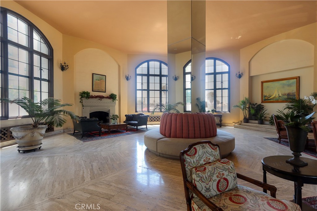 800 East Ocean Boulevard, Unit 1007 Long Beach, CA 90802 - Photo 30 of 43 a living room with furniture fireplace and a large window