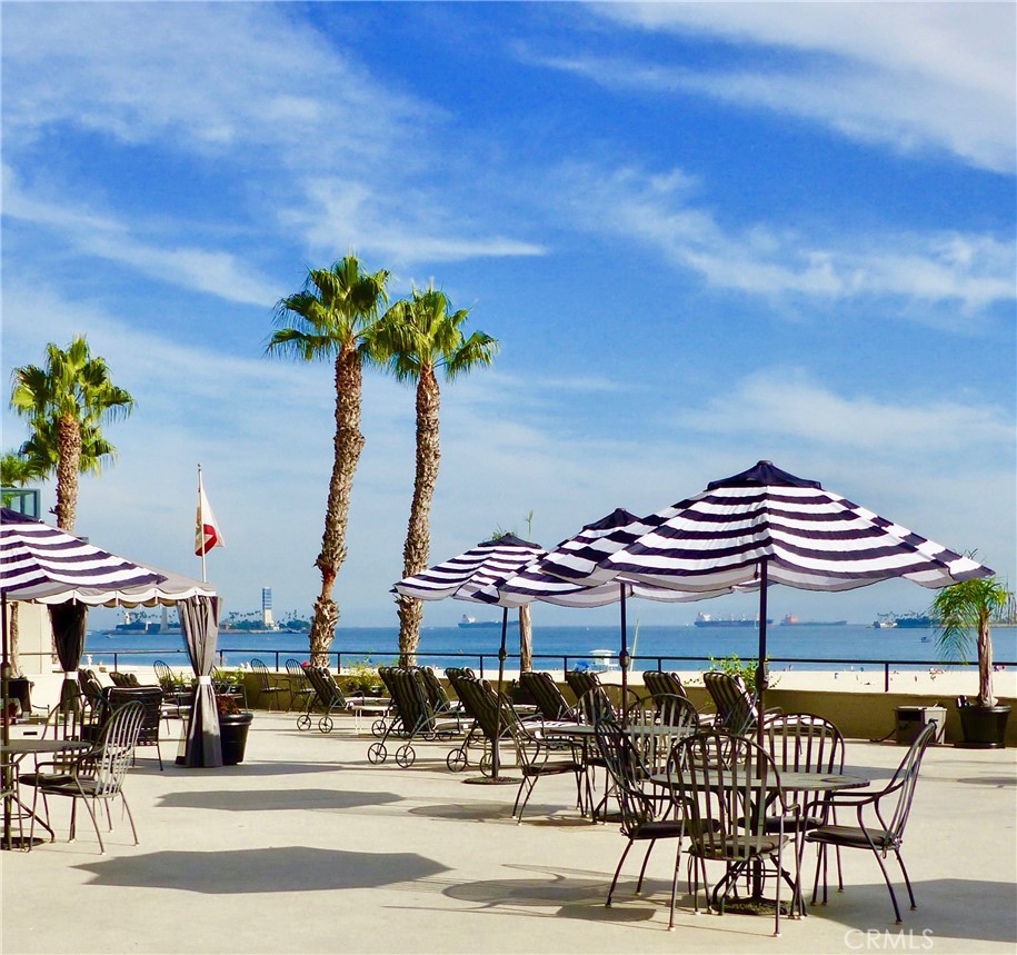 800 East Ocean Boulevard, Unit 1007 Long Beach, CA 90802 - Photo 31 of 43 a view of a swimming pool with a table and chairs