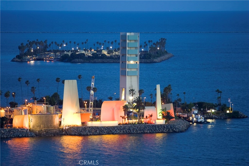 800 East Ocean Boulevard, Unit 1007 Long Beach, CA 90802 - Photo 38 of 43 a view of a dining room with furniture and wooden floor