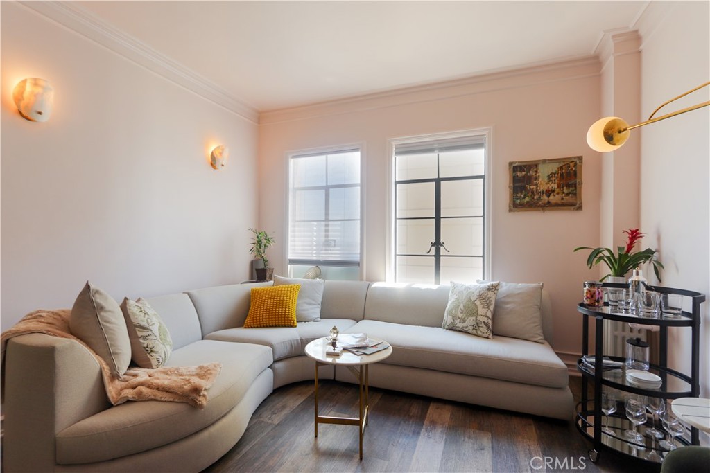 800 East Ocean Boulevard, Unit 1007 Long Beach, CA 90802 - Photo 4 of 43 a living room with furniture and a large window