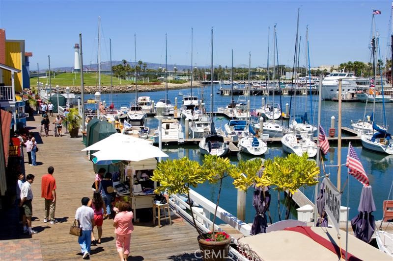 800 East Ocean Boulevard, Unit 1007 Long Beach, CA 90802 - Photo 42 of 43 a group of people sitting around in a yard