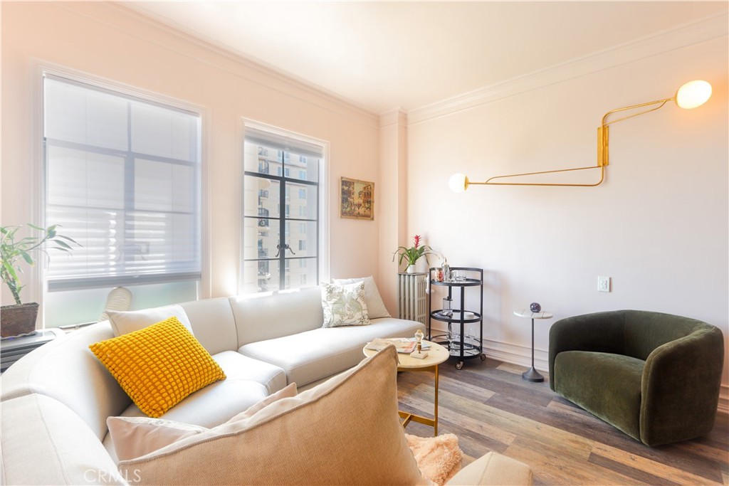 800 East Ocean Boulevard, Unit 1007 Long Beach, CA 90802 - Photo 5 of 43 a living room with furniture and a window
