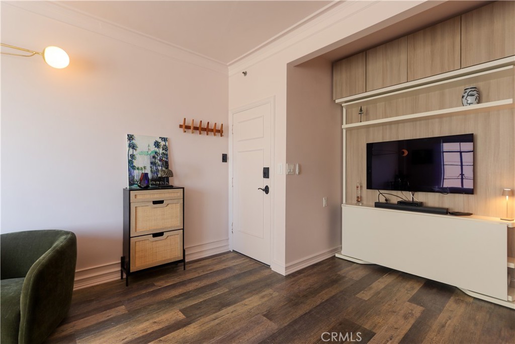 800 East Ocean Boulevard, Unit 1007 Long Beach, CA 90802 - Photo 8 of 43 a room with furniture and a fireplace