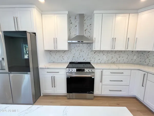 a view of a backyard of the house