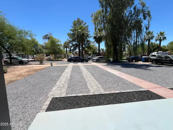 a kitchen with a stove sink and refrigerator