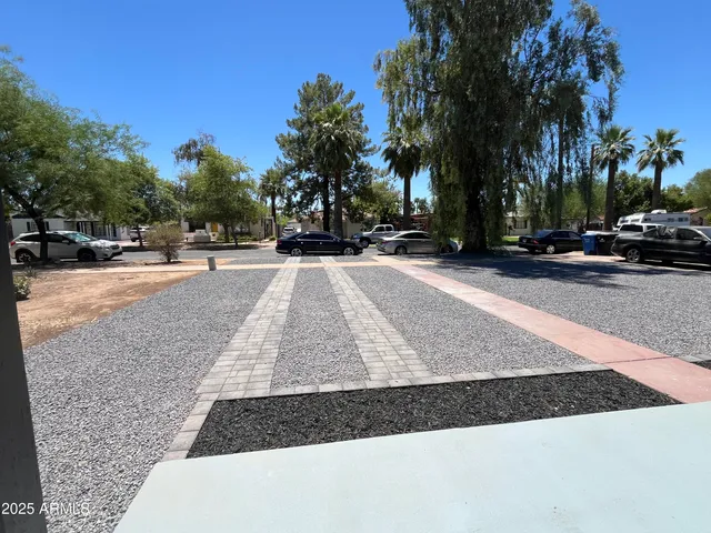 a kitchen with a stove sink and refrigerator