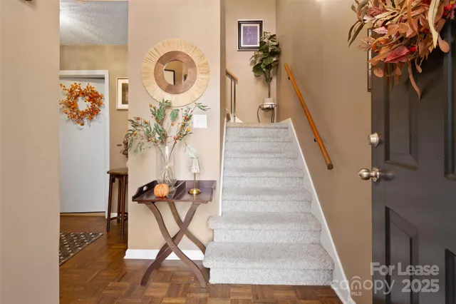 a view of entryway with wooden floor