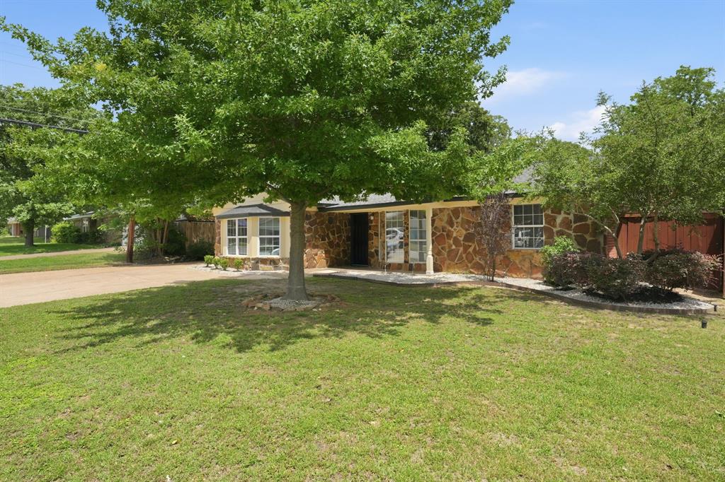 1108 Billie Ruth Lane Hurst, TX 76053 - Photo 21 of 27 Stone veneer exterior with a prominent bay window