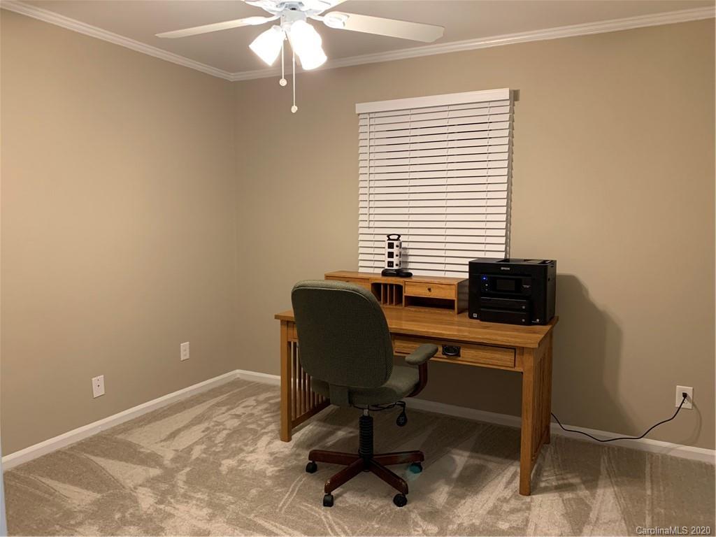 5923 Quail Hollow Road, Unit B Charlotte, NC 28210 - Photo 12 of 15 a view of a workspace with furniture and a window