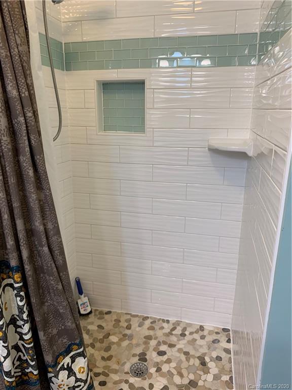 5923 Quail Hollow Road, Unit B Charlotte, NC 28210 - Photo 9 of 15 a bathroom with a shower
