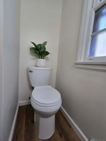 a bathroom with a toilet and a sink