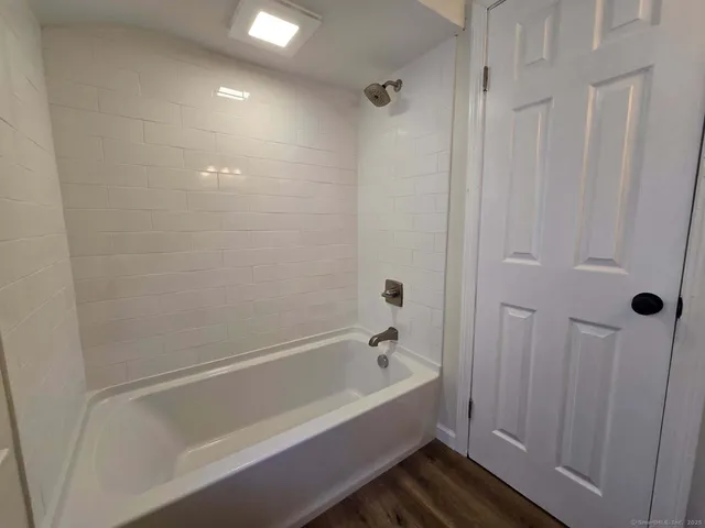 a bathroom with a bathtub