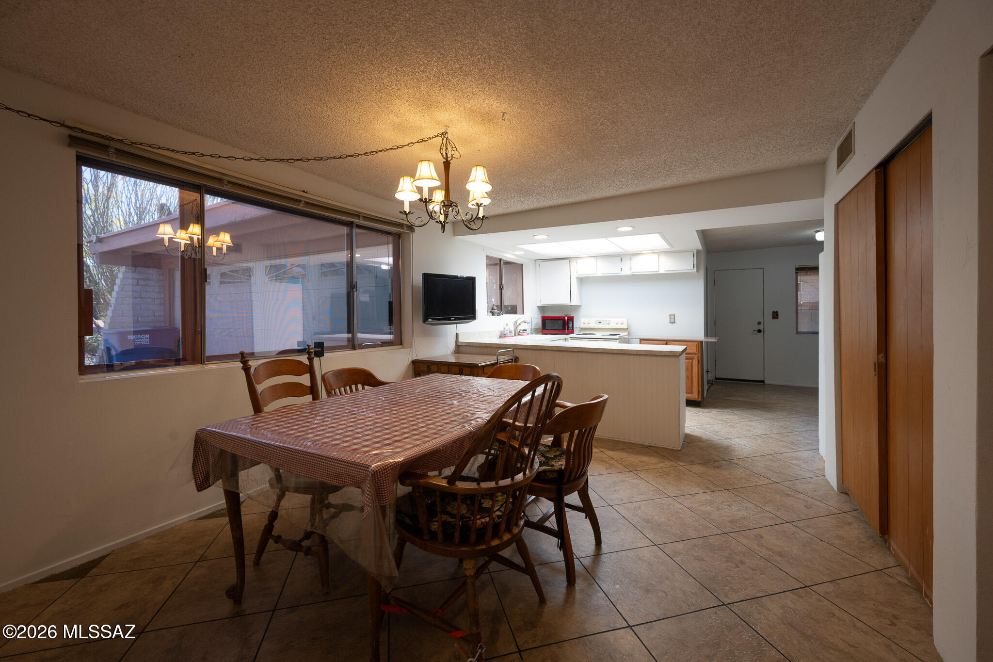 7749 East Pima Street Tucson, AZ 85715 - Photo 2 of 21 Dinning rm DSC_4733