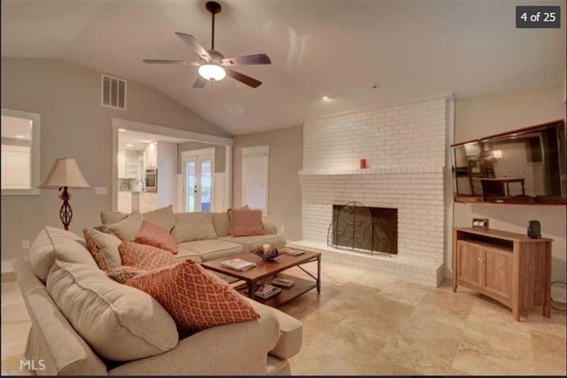 Large great room with woodburning fireplace