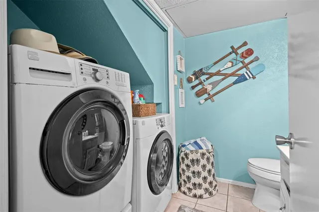 a bathroom with a sink a mirror and a toilet