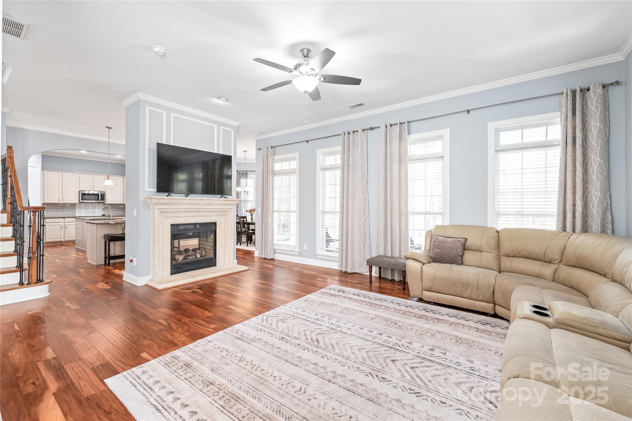 8504 Soaring Eagle Lane Waxhaw, NC 28173 - Photo 12 of 48 a living room with furniture fireplace and flat screen tv