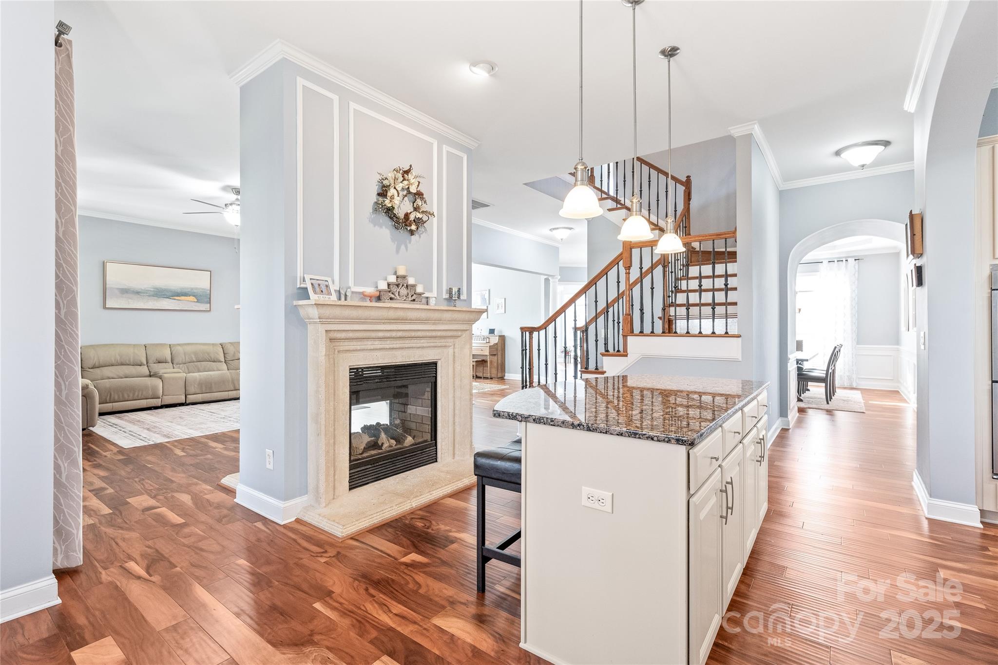 8504 Soaring Eagle Lane Waxhaw, NC 28173 - Photo 15 of 48 a very nice looking living room with a fireplace and wooden floor