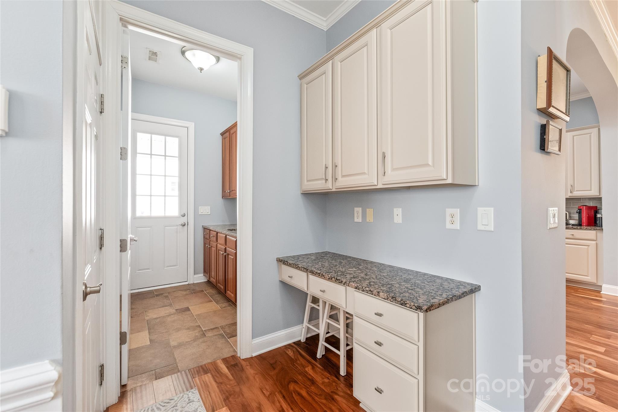 8504 Soaring Eagle Lane Waxhaw, NC 28173 - Photo 19 of 48 a view of a kitchen and utility room