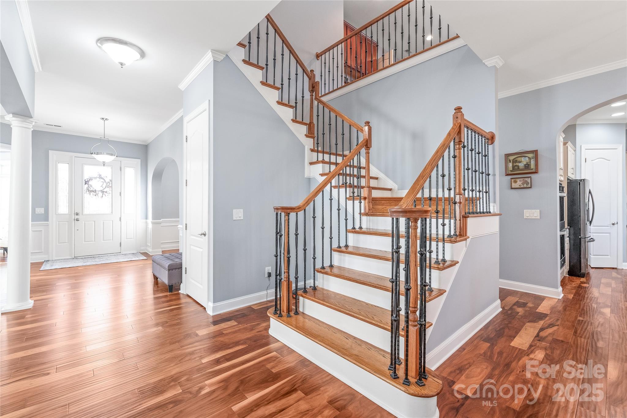 8504 Soaring Eagle Lane Waxhaw, NC 28173 - Photo 22 of 48 a view of entryway and hall with wooden floor