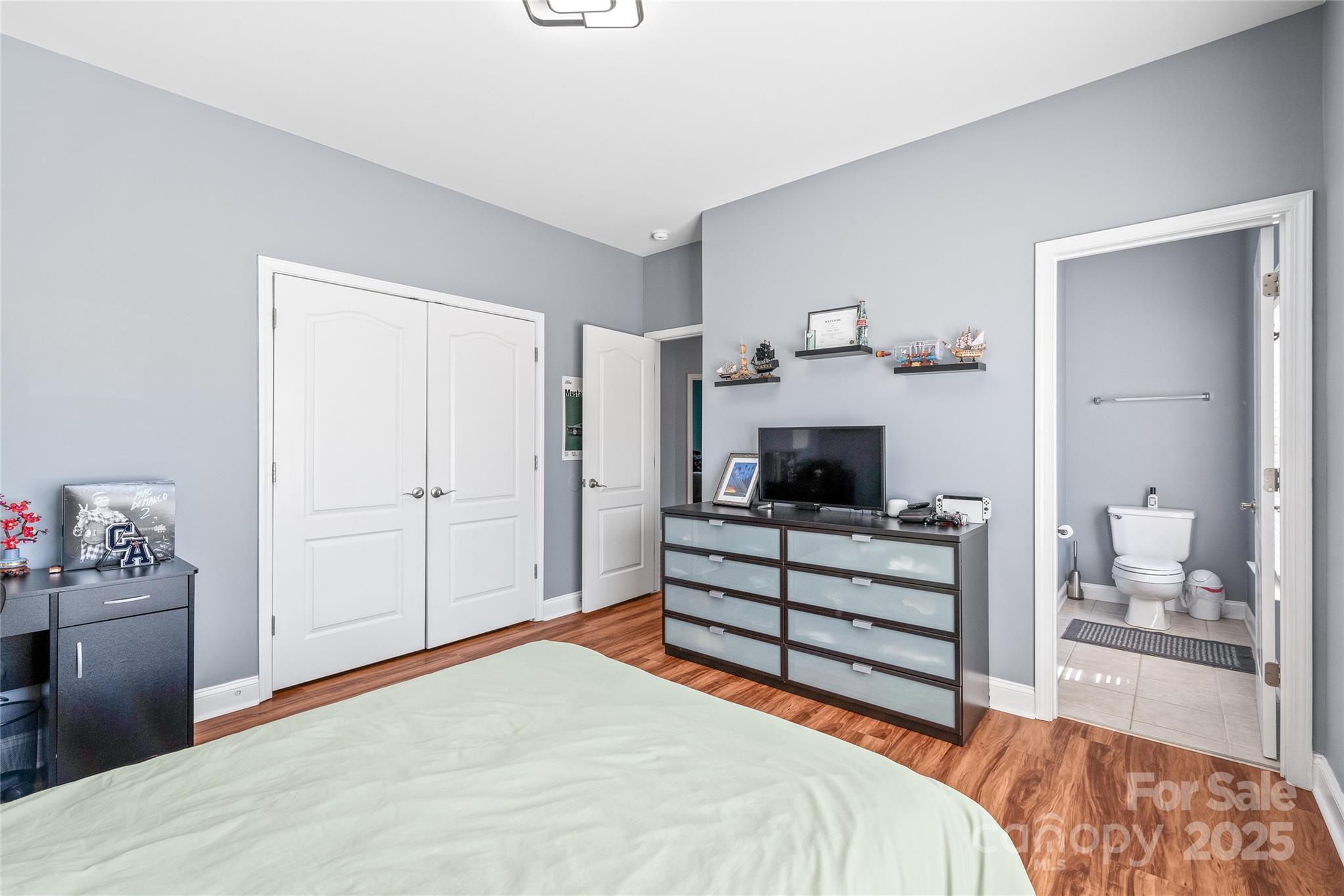 8504 Soaring Eagle Lane Waxhaw, NC 28173 - Photo 40 of 48 a bedroom with a bed and a view of kitchen