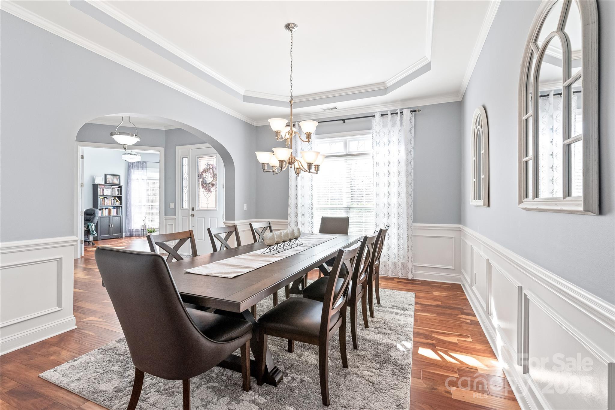 8504 Soaring Eagle Lane Waxhaw, NC 28173 - Photo 6 of 48 a view of a dining room with furniture and window