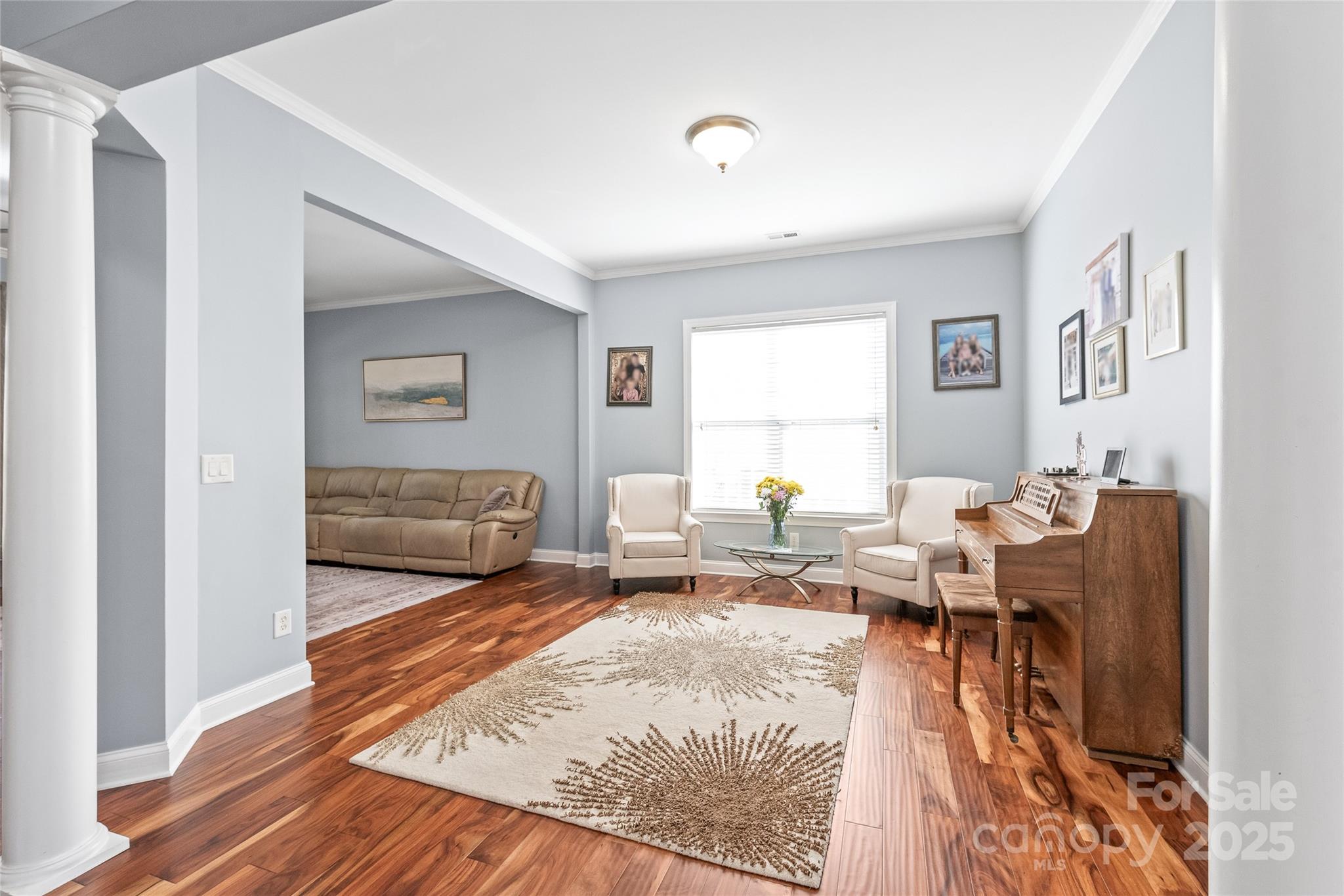 8504 Soaring Eagle Lane Waxhaw, NC 28173 - Photo 8 of 48 a living room with furniture or couch and a window