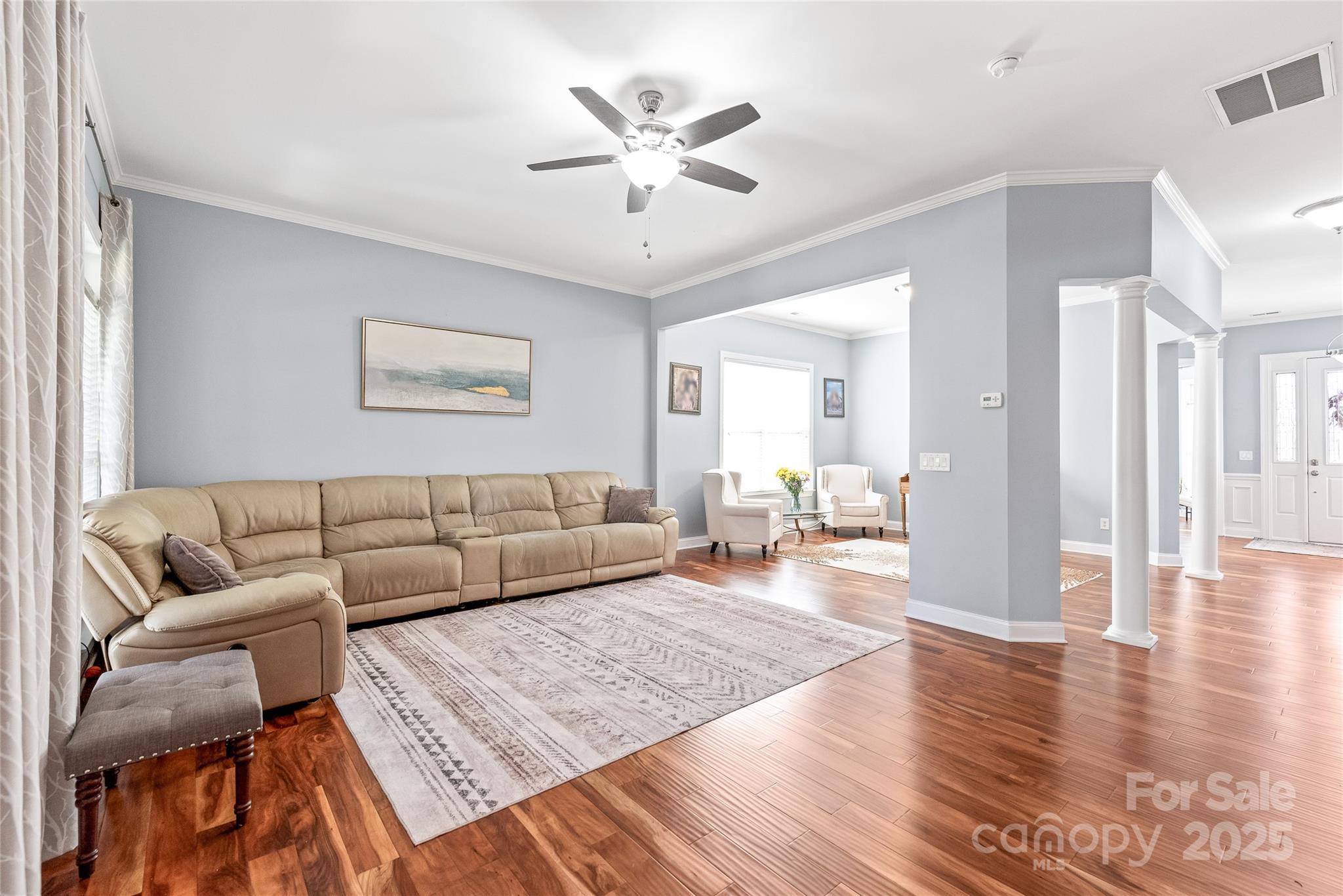 8504 Soaring Eagle Lane Waxhaw, NC 28173 - Photo 10 of 48 a living room with furniture and wooden floor