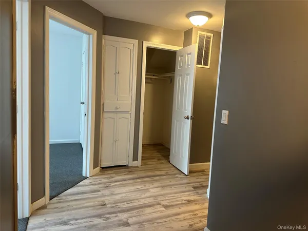 a view of a bathroom with sink and shower