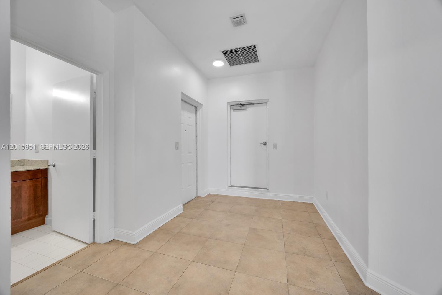 7275 Southwest 90th Street, Unit C719 Miami, FL 33156 - Photo 4 of 25 a view of an empty room