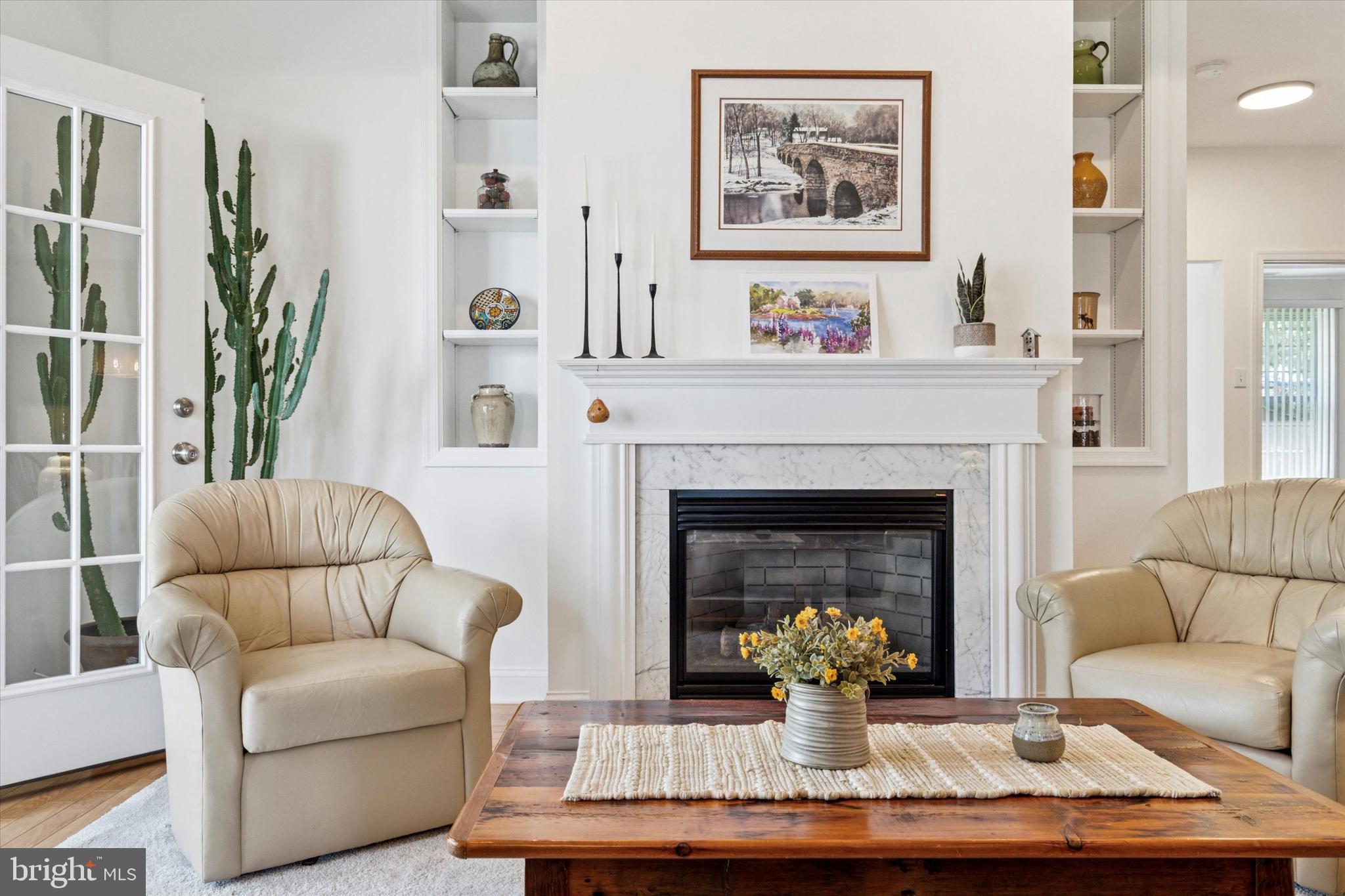 1518 Springfield Court, Unit 30 Jamison, PA 18929 - Photo 4 of 23 a living room with furniture and a fireplace