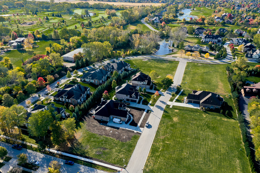 1017 Tadeusz Way Lemont, IL 60439 - Photo 5 of 10 an aerial view of residential houses with outdoor space and swimming pool