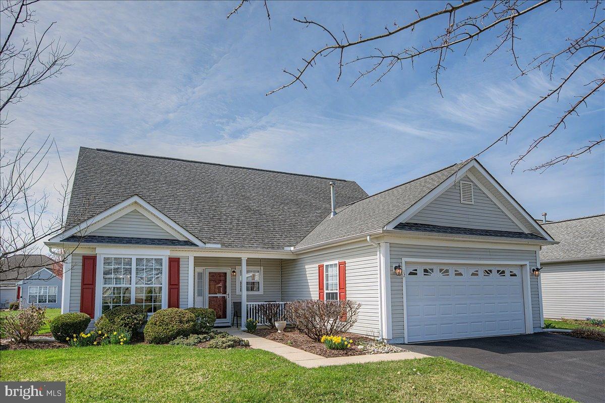 12 Springmill Drive Middletown, DE 19709 - Photo 1 of 31 a front view of house with yard and outdoor seating