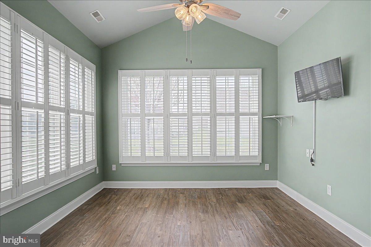 12 Springmill Drive Middletown, DE 19709 - Photo 16 of 31 a view of an empty room with wooden floor and a window
