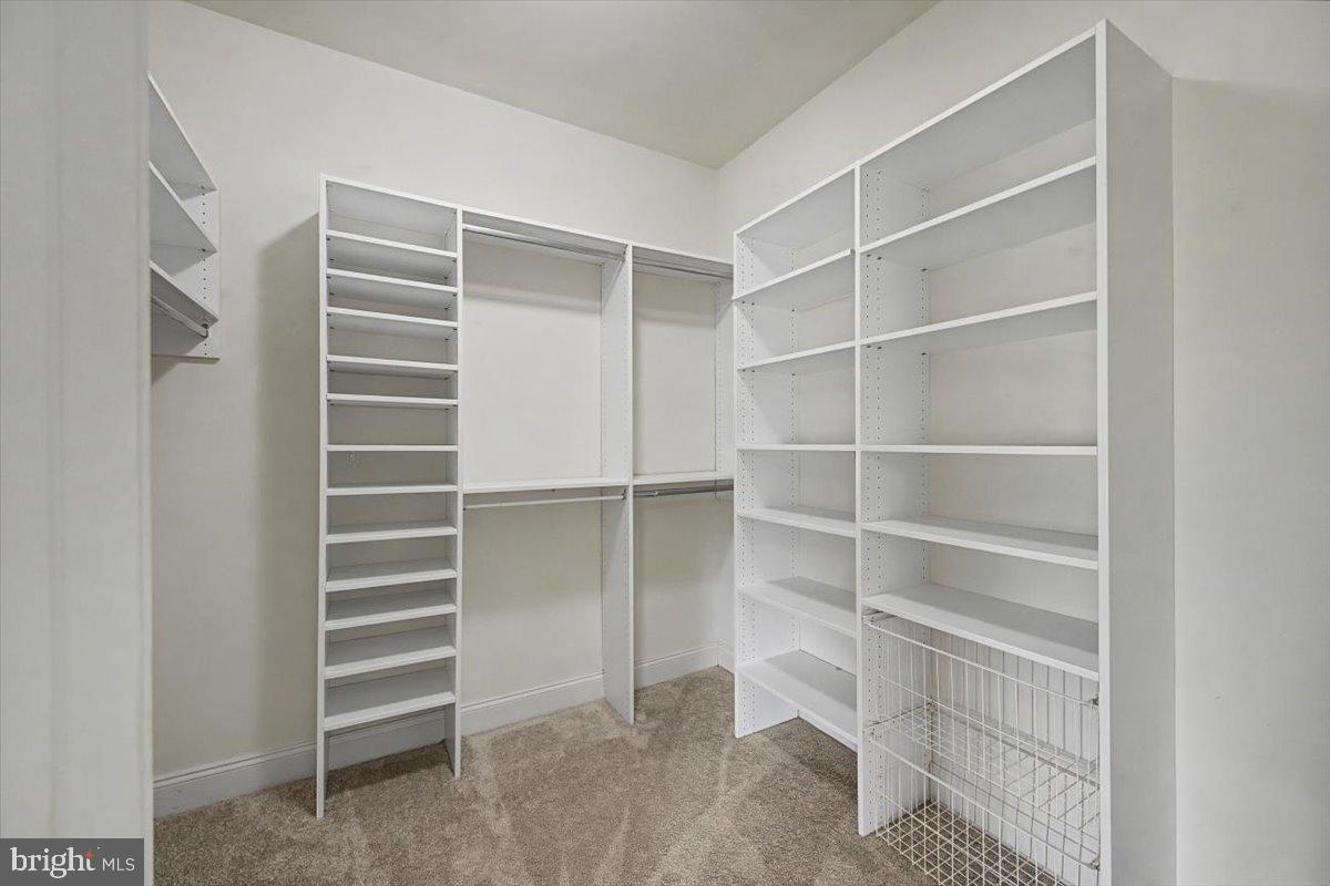 12 Springmill Drive Middletown, DE 19709 - Photo 20 of 31 a view of walk in closet with empty racks