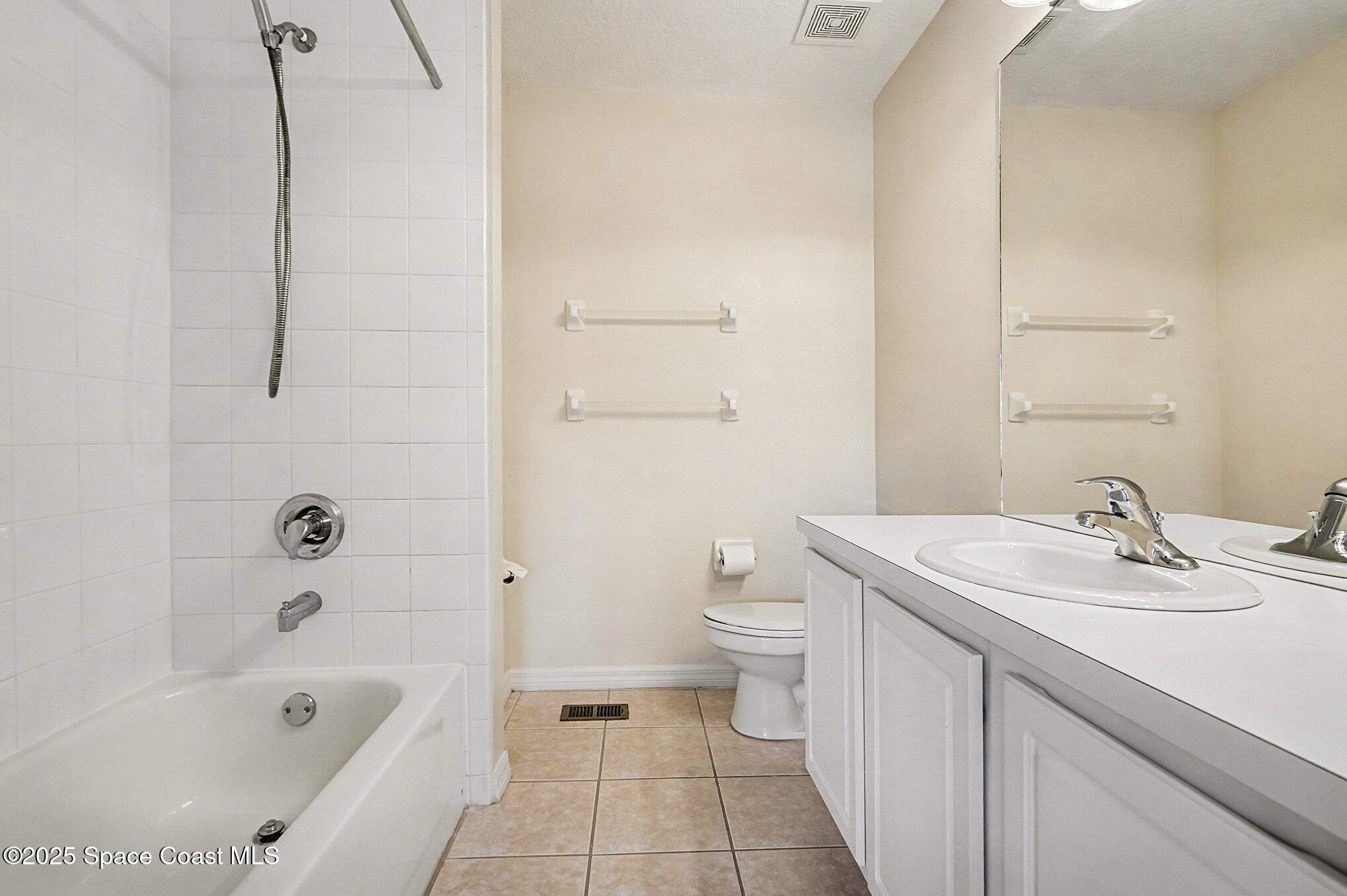 1352 Hampton Park Lane Melbourne, FL 32940 - Photo 13 of 15 a bathroom with a sink a toilet and bathtub