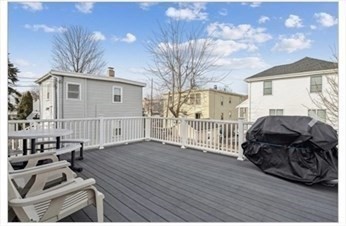 65 Camden Street, Unit 1 Lynn, MA 01905 - Photo 14 of 14 a car parked on the side of a street