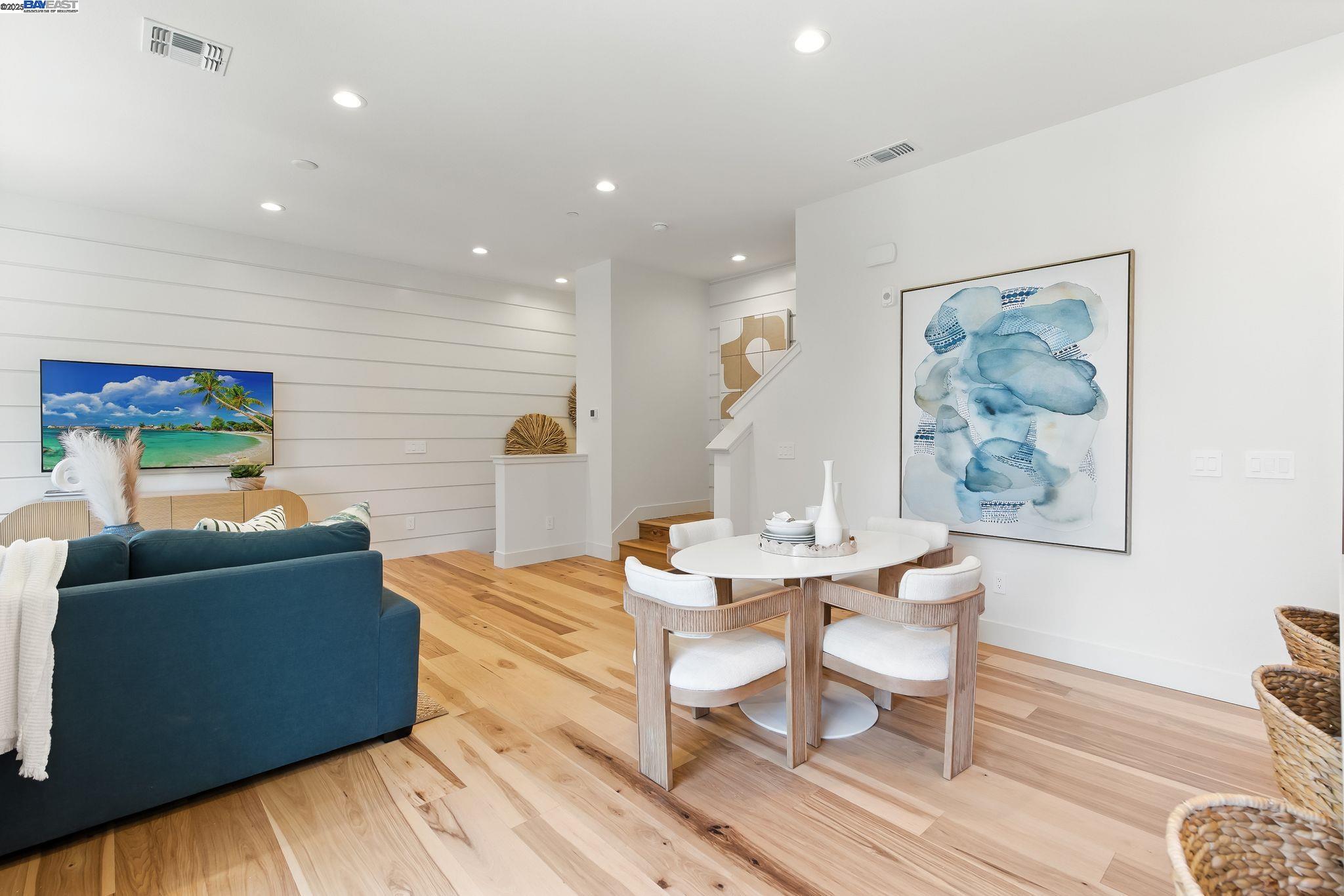 1937 Grand Street Alameda, CA 94501 - Photo 2 of 29 a living room with furniture and a wooden floor