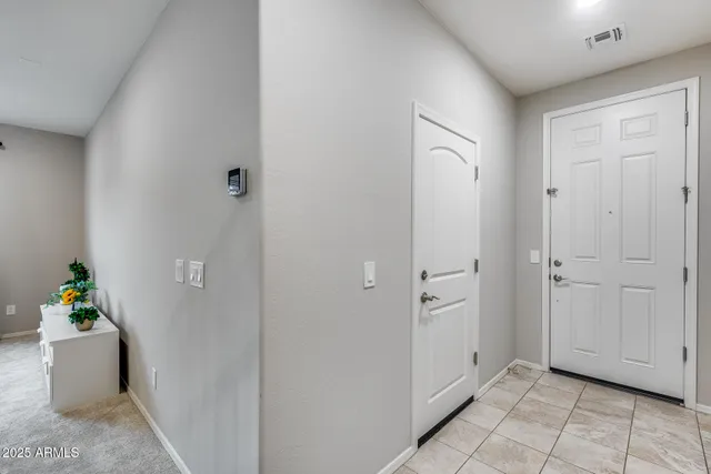 a view of an entryway with a window