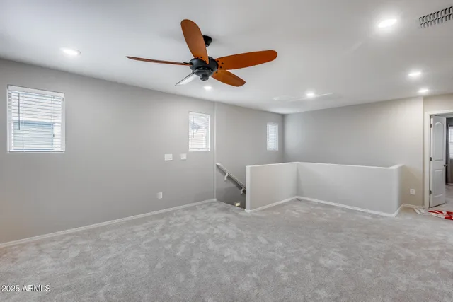 a kitchen with granite countertop a sink appliances and cabinets
