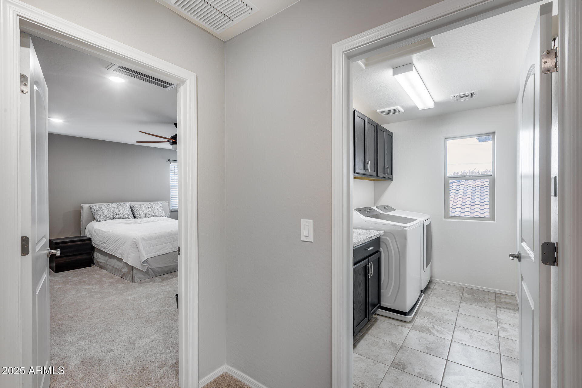 6853 East Posada Circle Mesa, AZ 85212 - Photo 22 of 45 a en suite bathroom with a toilet sink and tub