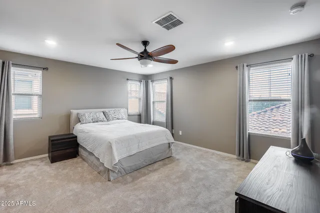 a en suite bathroom with a toilet sink and tub
