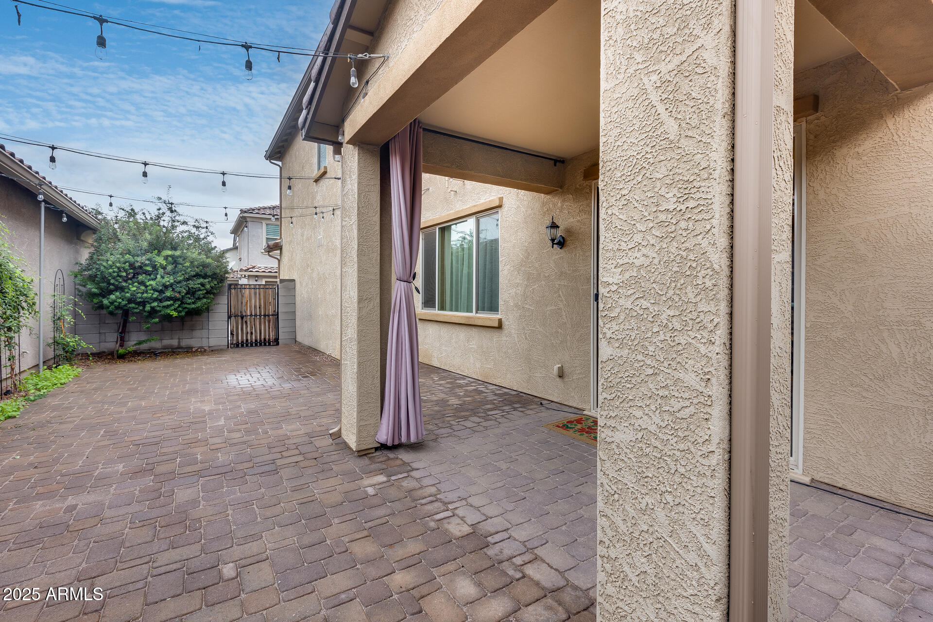 6853 East Posada Circle Mesa, AZ 85212 - Photo 42 of 45 a view of a house with a yard
