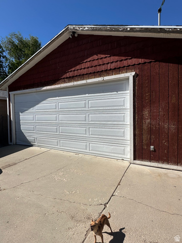 8320 West 3100th Street South Magna, UT 84044 - Photo 40 of 41 Garage featuring driveway