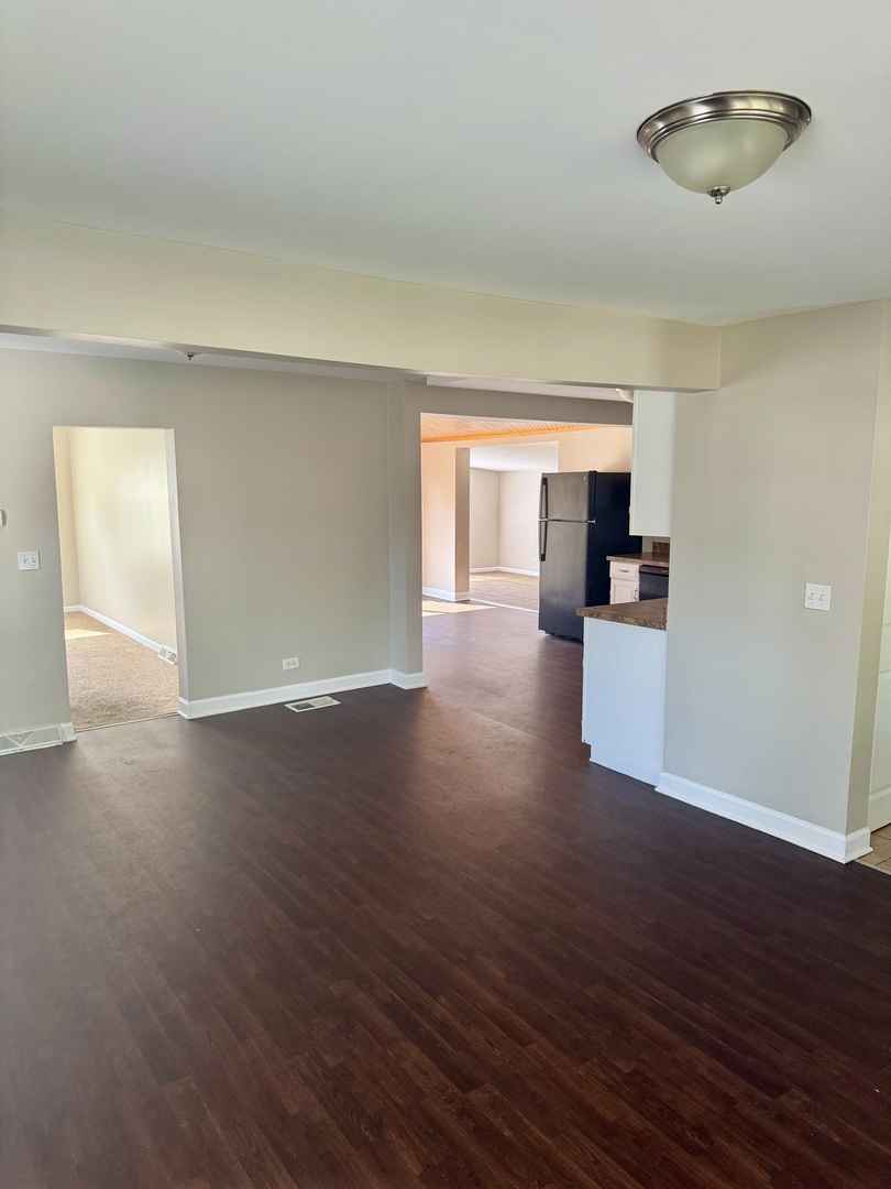 14503 Waverly Avenue Midlothian, IL 60445 - Photo 15 of 37 a view of empty room with wooden floor