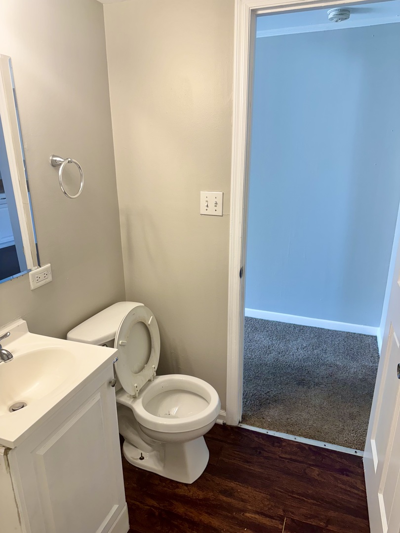 14503 Waverly Avenue Midlothian, IL 60445 - Photo 21 of 37 a bathroom with a toilet and a sink