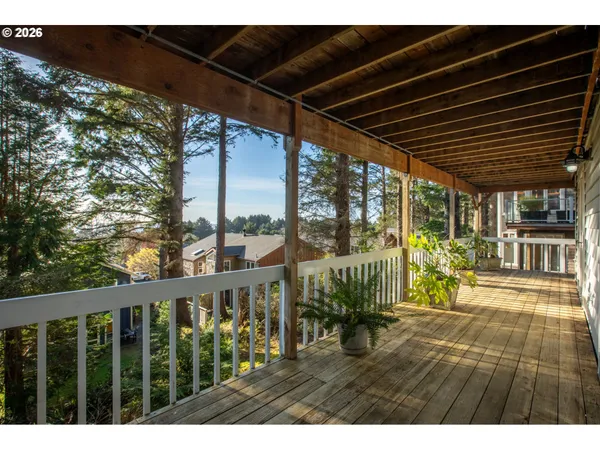 a view of porch with a furniture