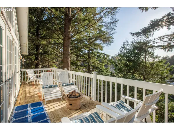 a view of balcony with wooden floor