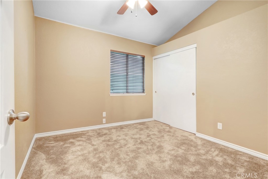 7622 Belpine Place Rancho Cucamonga, CA 91730 - Photo 11 of 15 a view of an empty room with a window