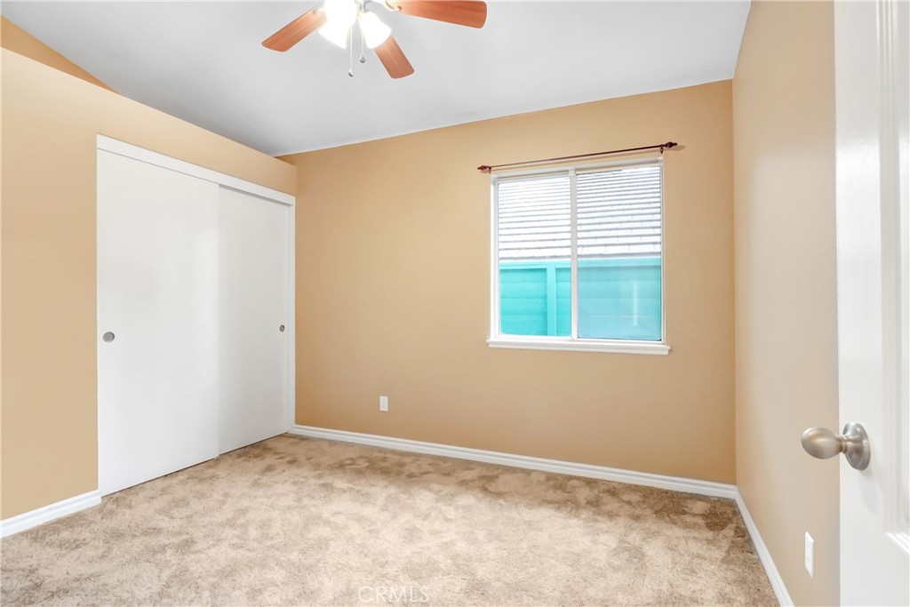 7622 Belpine Place Rancho Cucamonga, CA 91730 - Photo 12 of 15 a view of an empty room with a window